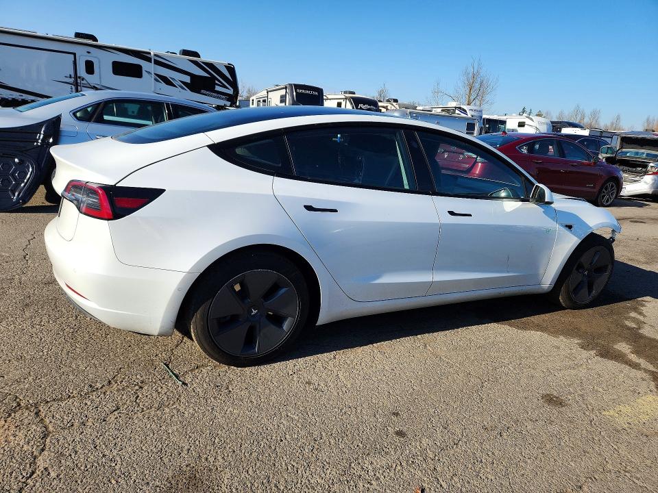 Photo 3 from auction – 2022 TESLA MODEL 3 with VIN 5YJ3E1EAXNF106809