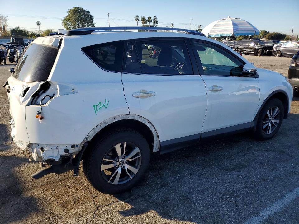 Photo 3 from auction – 2018 TOYOTA RAV4 with VIN JTMWFREV4JJ171251