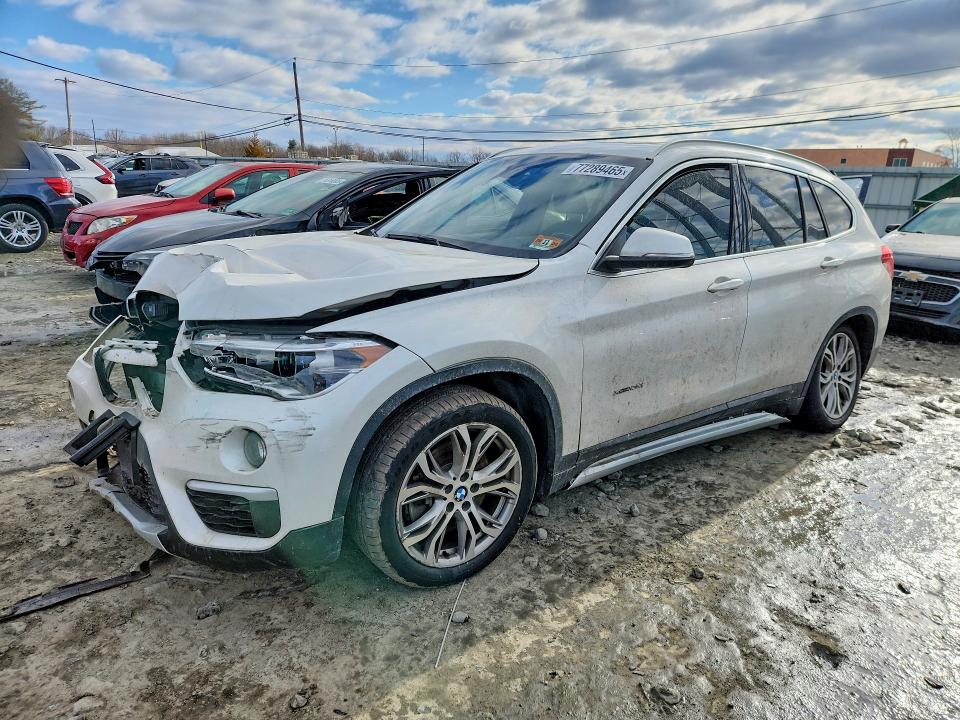 BMW X1 2017 with VIN WBXHT3C33H5F83797 - Photo from auction