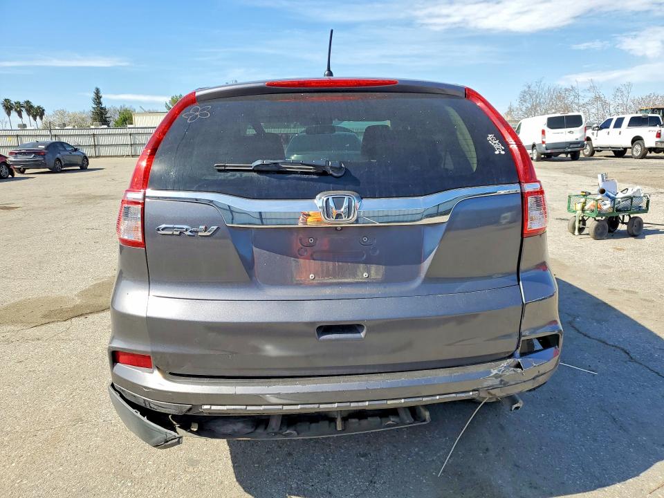 Photo 6 from auction – 2015 HONDA CR-V with VIN 2HKRM3H5XFH531988