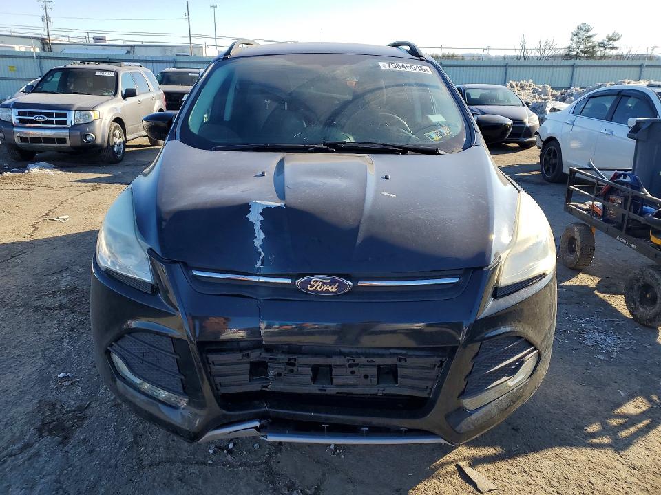 Photo 5 from auction – 2014 FORD ESCAPE with VIN 1FMCU9G92EUE05704