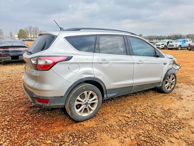 Photo 3 from auction – 2018 FORD ESCAPE with VIN 1FMCU0GD0JUA90623