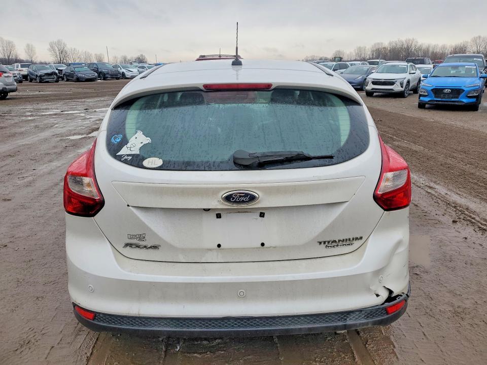 Photo 6 from auction – 2014 FORD FOCUS with VIN 1FADP3N29EL168000