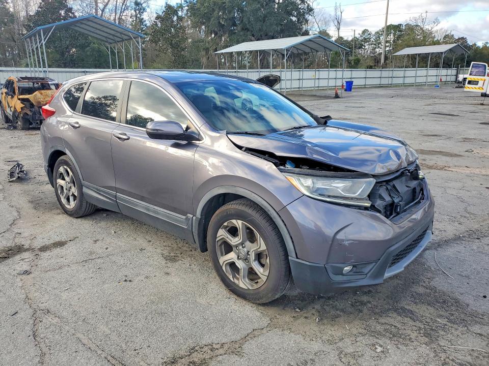 Photo 4 from auction – 2017 HONDA CR-V EXL with VIN 7FARW1H81HE021995