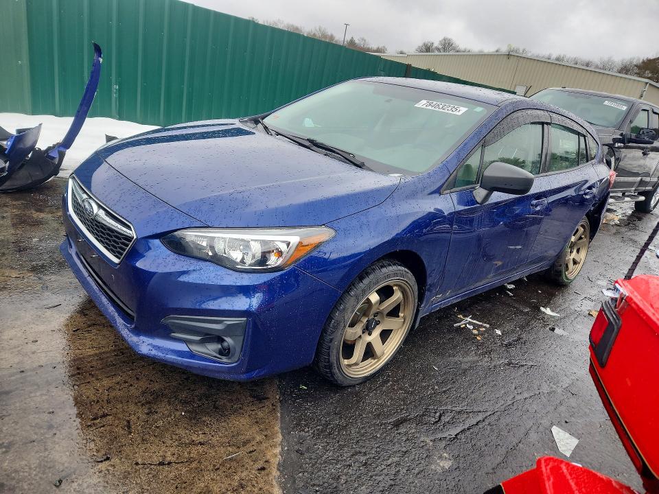 SUBARU IMPREZA 2017 with VIN 4S3GTAA60H3700996 - Photo from auction