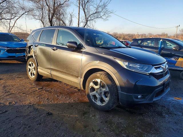 Photo 4 from auction – 2019 HONDA CR-V with VIN 2HKRW2H56KH609083