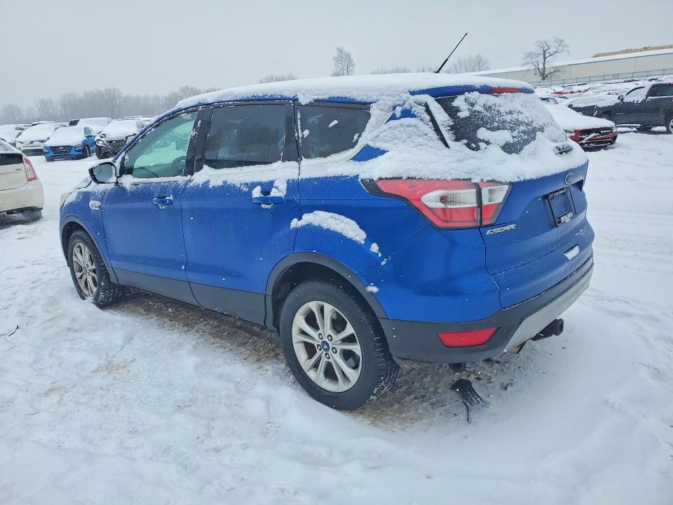 Photo 2 from auction – 2017 FORD ESCAPE with VIN 1FMCU9GD1HUD08115