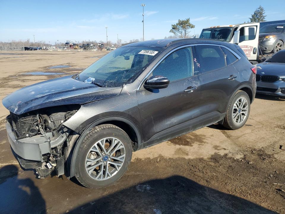 FORD ESCAPE 2020 with VIN 1FMCU9H63LUC30610 - Photo from auction