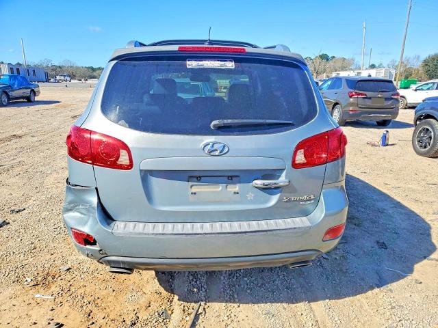 Photo 6 from auction – 2007 HYUNDAI SANTA FE with VIN 5NMSH13E67H075844