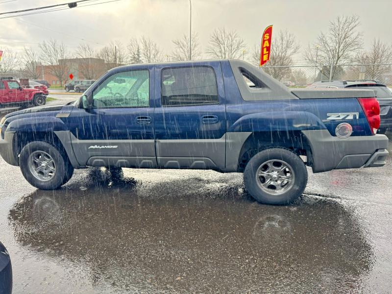 Photo 11 from auction – 2002 CHEVROLET AVALANCHE with VIN 3GNEK13T32G137306
