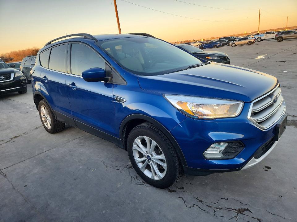 Photo 4 from auction – 2018 FORD ESCAPE with VIN 1FMCU9GD2JUD36687