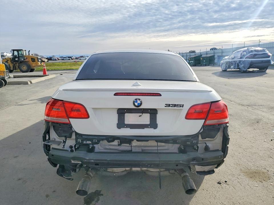 Photo 6 from auction – 2009 BMW 335 I with VIN WBAWL73529P473692
