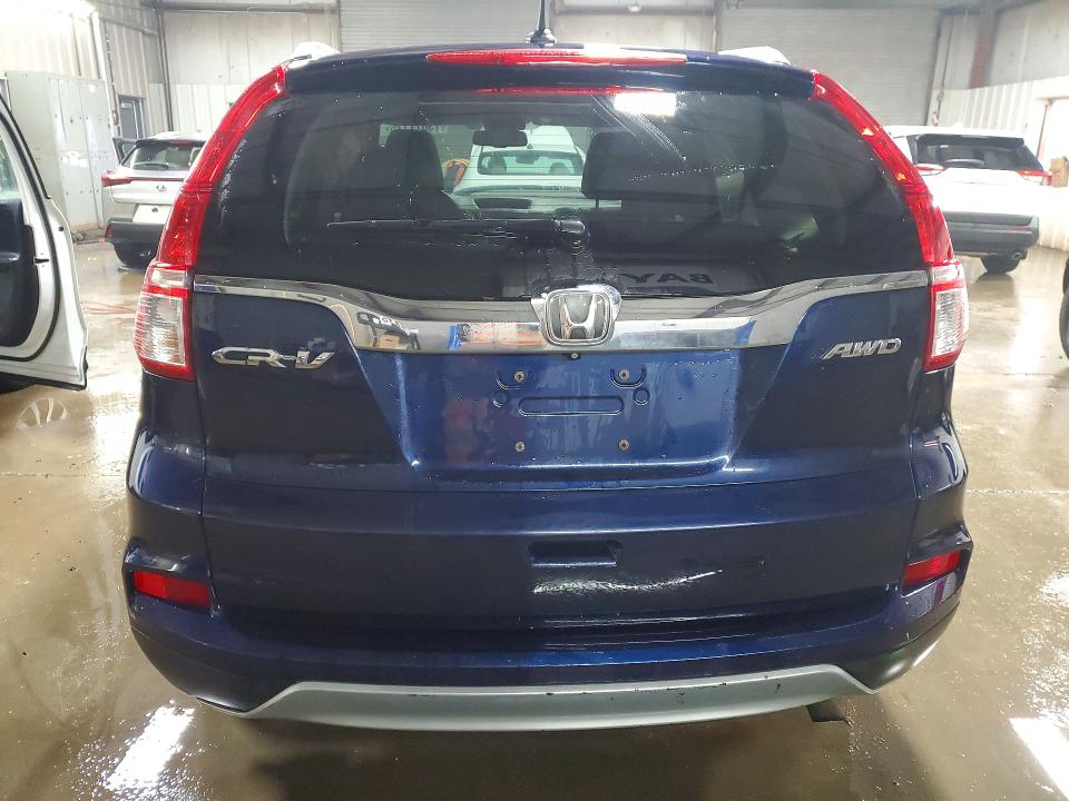 Photo 6 from auction – 2015 HONDA CR-V with VIN 5J6RM4H70FL006791