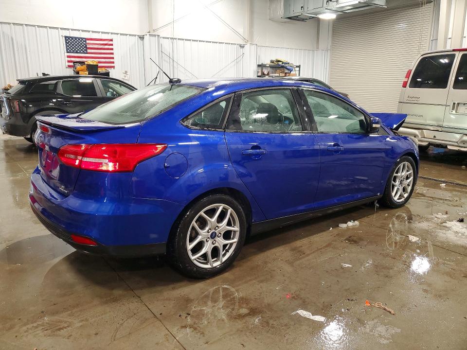Photo 3 from auction – 2015 FORD FOCUS with VIN 1FADP3F2XFL229659