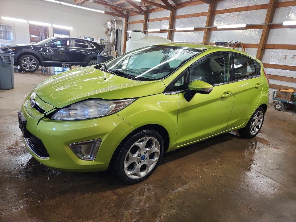 FORD FIESTA SES 2011 с VIN 3FADP4FJ7BM124728 - Фото с аукциона