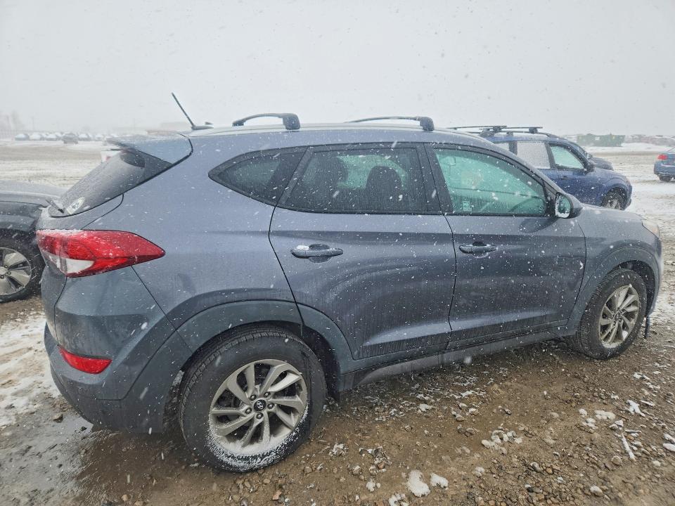 Photo 3 from auction – 2016 HYUNDAI TUCSON LIM with VIN KM8J33A42GU195452