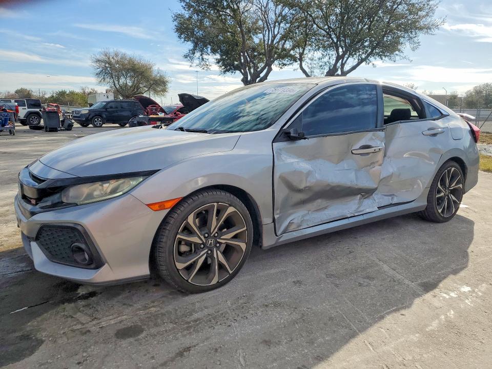 HONDA CIVIC 2017 with VIN 2HGFC1E51HH700596 - Photo from auction