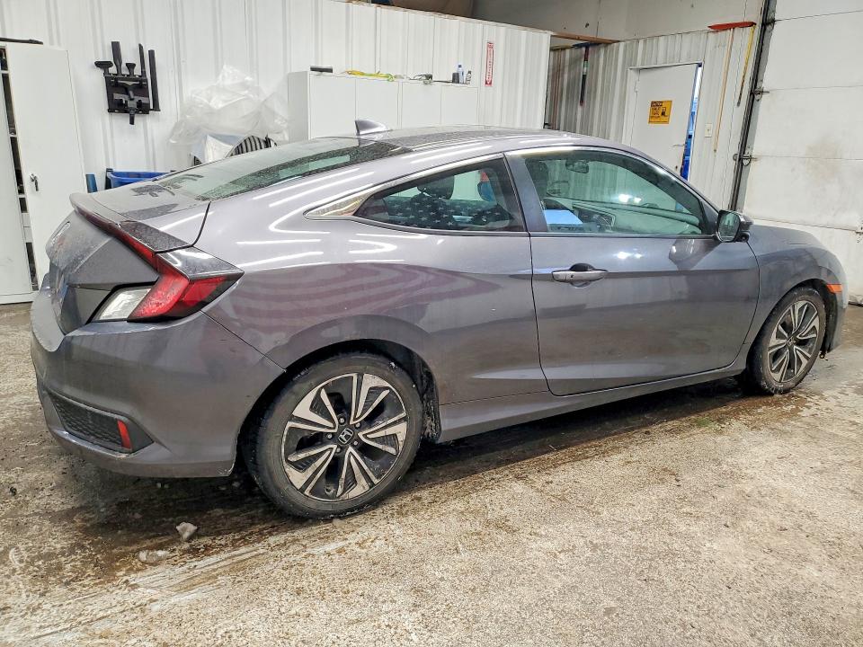 Foto 3 de la subasta – 2016 HONDA CIVIC con VIN 2HGFC3B32GH355298