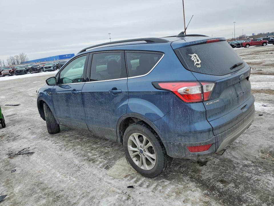 Photo 2 from auction – 2018 FORD ESCAPE with VIN 1FMCU9GDXJUB51447