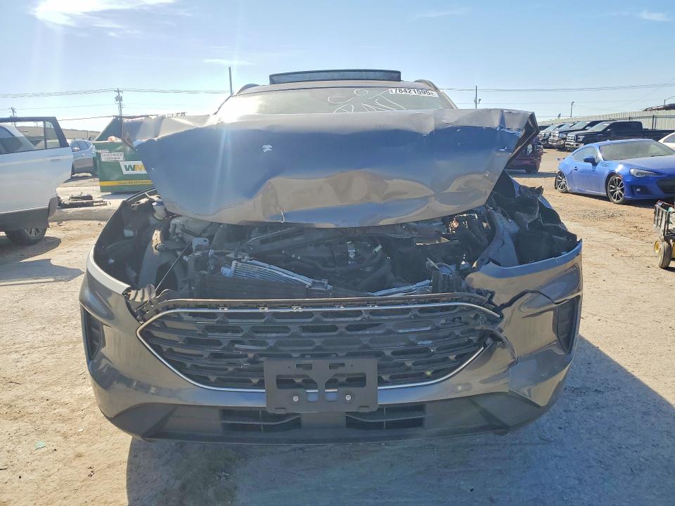 Photo 5 from auction – 2021 FORD ESCAPE with VIN 1FMCU0G63MUA99435