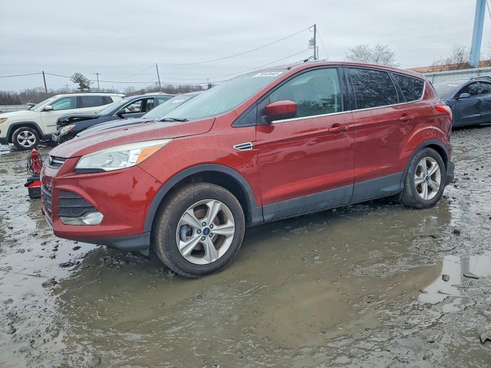 FORD ESCAPE 2014 with VIN 1FMCU0GX2EUD57048 - Photo from auction