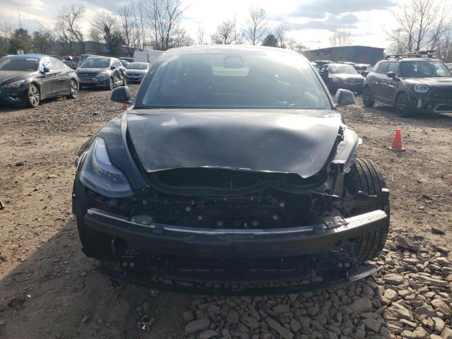 Photo 5 from auction – 2023 TESLA MODEL 3 with VIN 5YJ3E1EA1PF690925