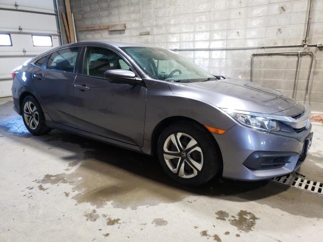 Photo 4 from auction – 2018 HONDA CIVIC LX with VIN 19XFC2F52JE002888