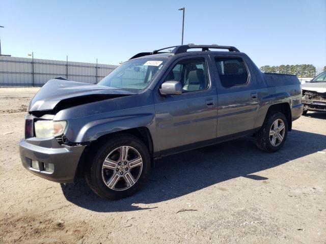 HONDA RIDGELINE 2012 with VIN 5FPYK1F51CB002455 - Photo from auction