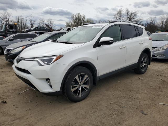 TOYOTA RAV4 XLE 2017 with VIN JTMRFREV6HD210430 - Photo from auction