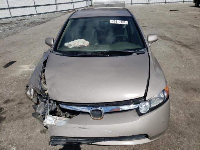Photo 5 from auction – 2006 HONDA CIVIC LX with VIN 1HGFA16596L130285