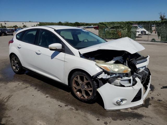 Foto 4 de la subasta – 2014 FORD FOCUS SE con VIN 1FADP3K2XEL443989