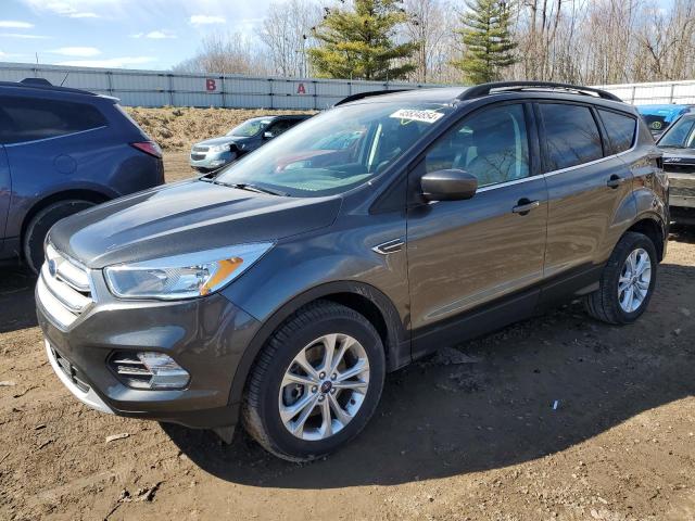 FORD ESCAPE SE 2018 with VIN 1FMCU9GD2JUD28461 - Photo from auction