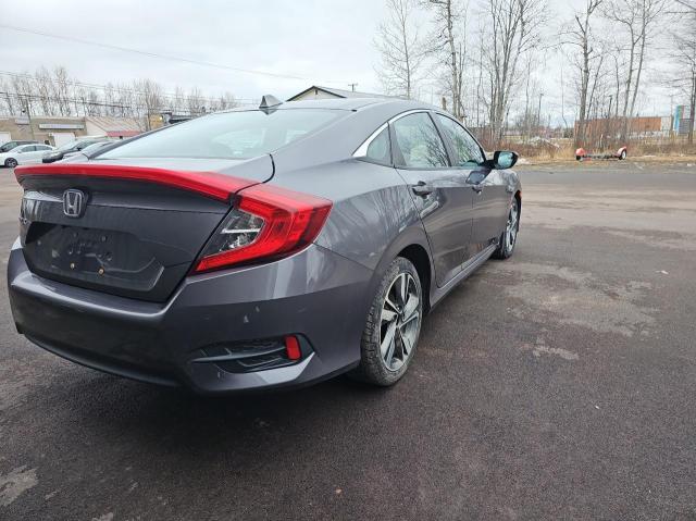 Photo 4 from auction – 2017 HONDA CIVIC LX with VIN 2HGFC2F55HH033911