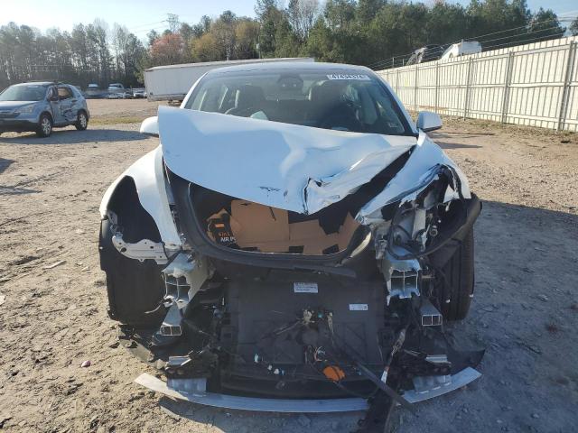 Photo 5 from auction – 2022 TESLA MODEL 3 with VIN 5YJ3E1EB1NF325134