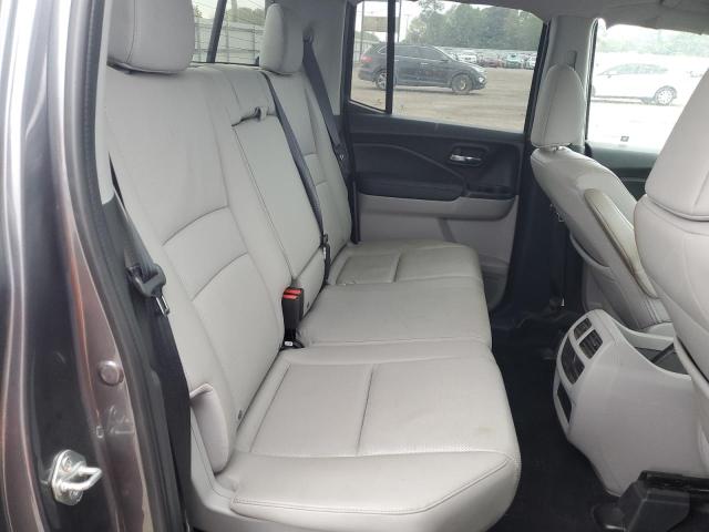 Photo 10 from auction – 2018 HONDA RIDGELINE with VIN 5FPYK3F78JB002401