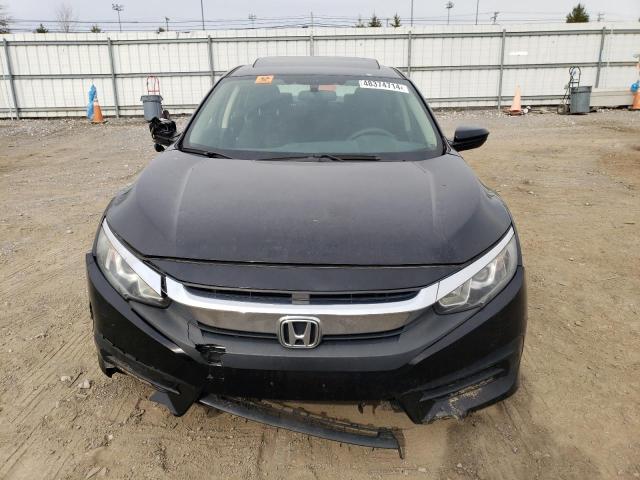 Photo 5 from auction – 2018 HONDA CIVIC EX with VIN 2HGFC2F74JH560751