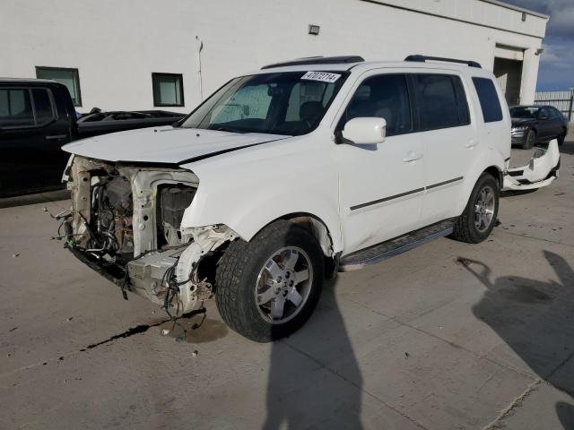 HONDA PILOT TOUR 2010 with VIN 5FNYF4H90AB019890 - Photo from auction
