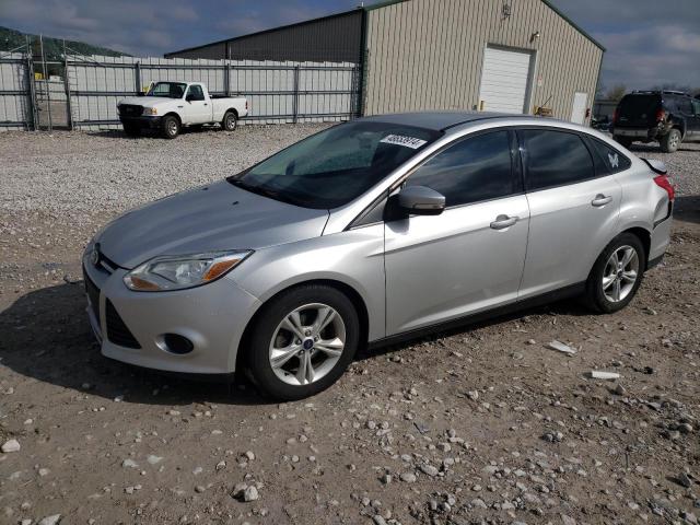 FORD FOCUS SE 2014 with VIN 1FADP3F23EL389011 - Photo from auction
