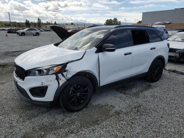 KIA SORENTO LX 2016 with VIN 5XYPG4A57GG035585 - Photo from auction