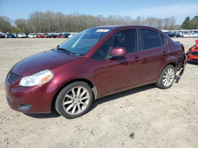 SUZUKI SX4 LE 2011 with VIN JS2YC5A28B6302911 - Photo from auction