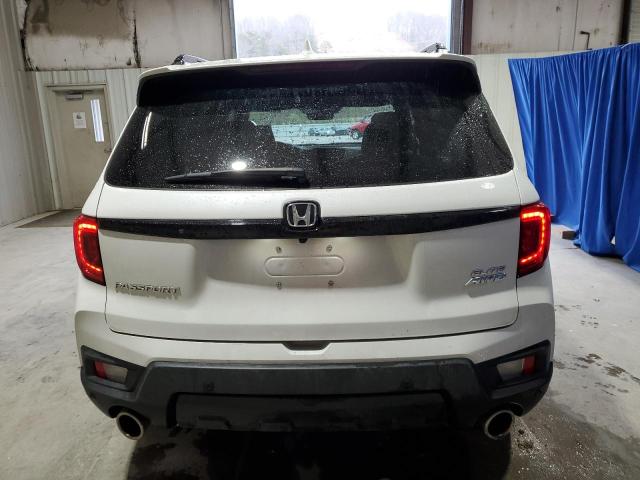 Photo 6 from auction – 2022 HONDA PASSPORT E with VIN 5FNYF8H05NB004199