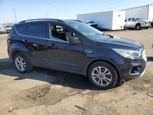 Photo 4 from auction – 2018 FORD ESCAPE SE with VIN 1FMCU0GD2JUC18361