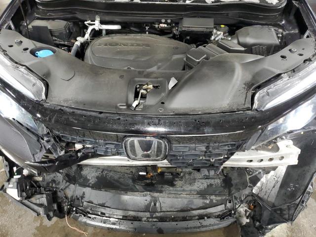 Photo 11 from auction – 2021 HONDA PASSPORT E with VIN 5FNYF8H55MB020025