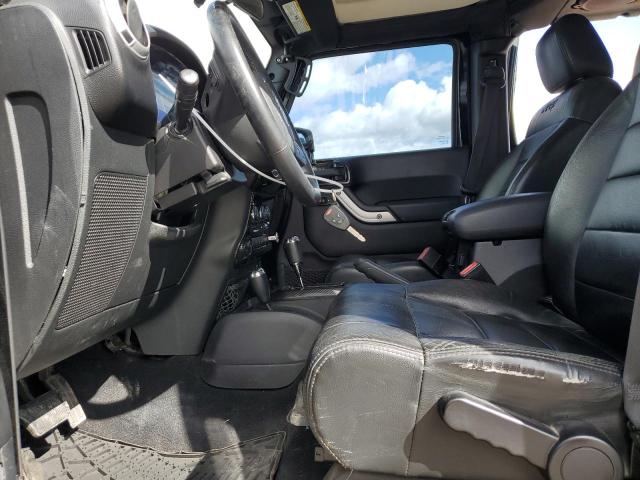 Photo 7 from auction – 2011 JEEP WRANGLER U with VIN 1J4BA5H19BL627257