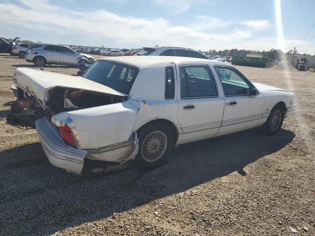 Photo 3 from auction – 1994 LINCOLN TOWN CAR E with VIN 1LNLM81WXRY773250