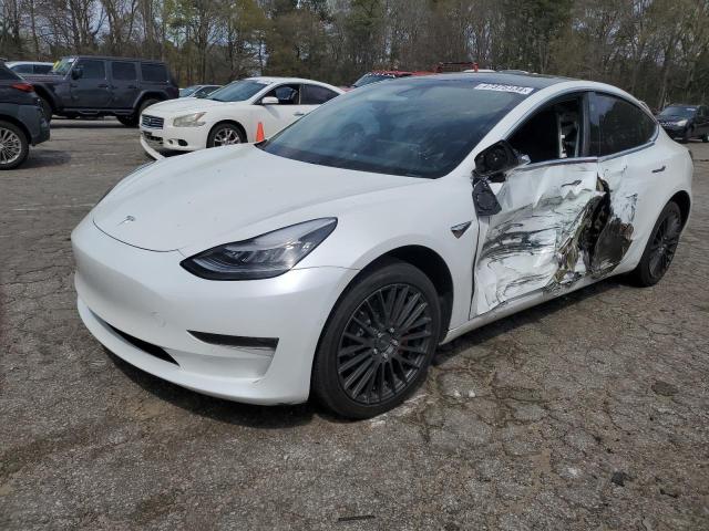 TESLA MODEL 3 2020 with VIN 5YJ3E1EAXLF737654 - Photo from auction