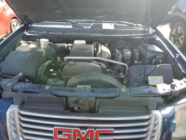 Photo 12 from auction – 2006 GMC ENVOY with VIN 1GKDS13S062214180