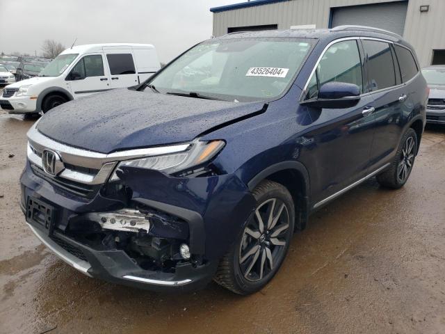 HONDA PILOT TOUR 2022 with VIN 5FNYF6H98NB030332 - Photo from auction