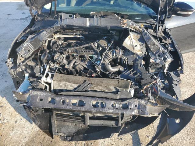 Photo 11 from auction – 2014 FORD FOCUS SE with VIN 1FADP3F20EL128810