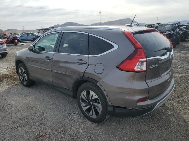Photo 2 from auction – 2015 HONDA CR-V TOURI with VIN 5J6RM4H92FL126142